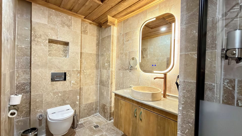 Deluxe Double Room, Balcony | Bathroom | Shower, hair dryer, slippers, towels