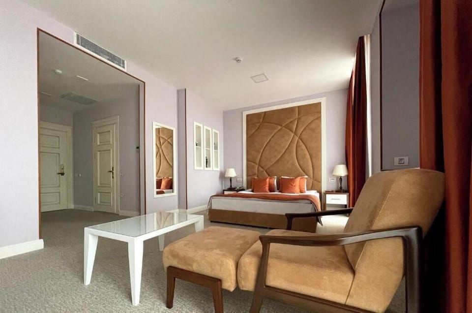 Deluxe Double Room, Balcony, Mountain View | Minibar, in-room safe, desk, laptop workspace