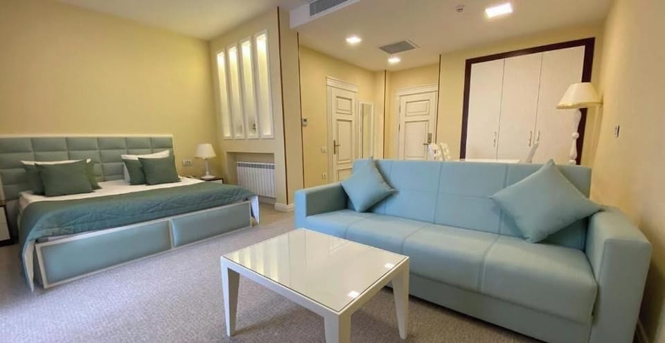 Junior Suite, Mountain View | Minibar, in-room safe, desk, laptop workspace