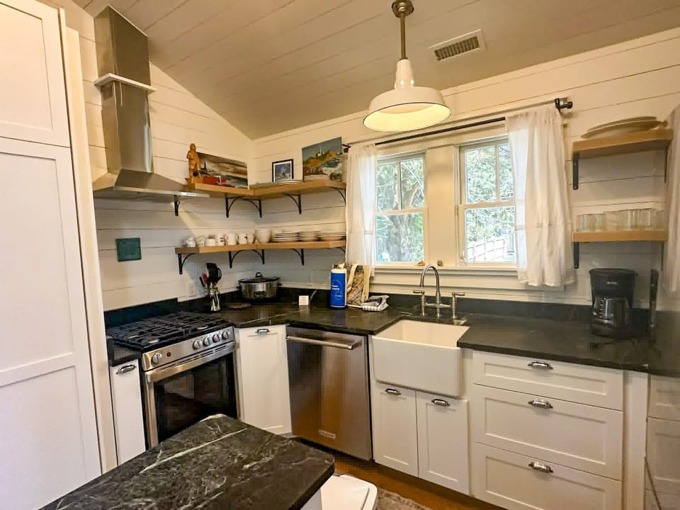 Kitchen with New Stove and Farmhouse Sink