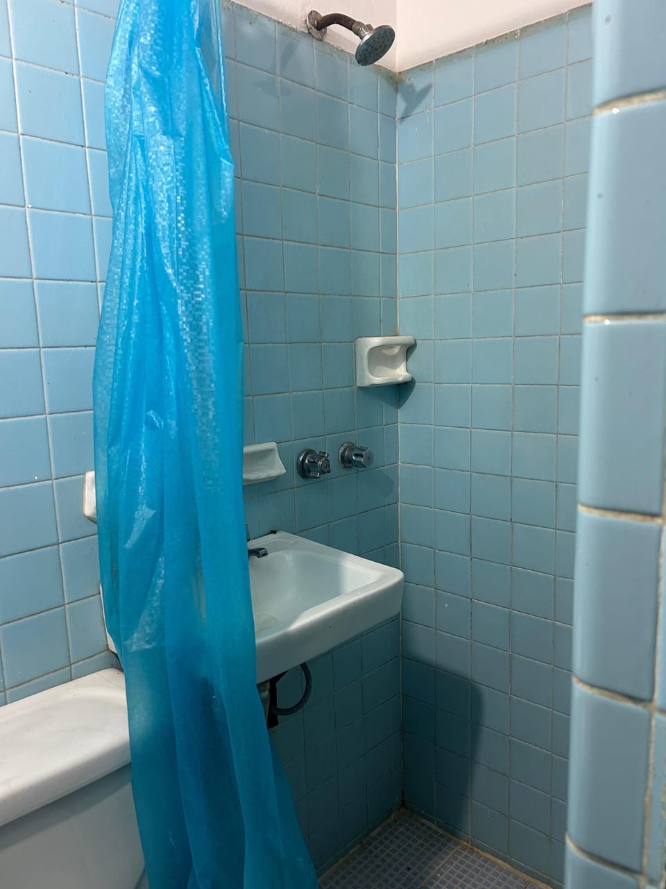 Shower, towels, soap, toilet paper