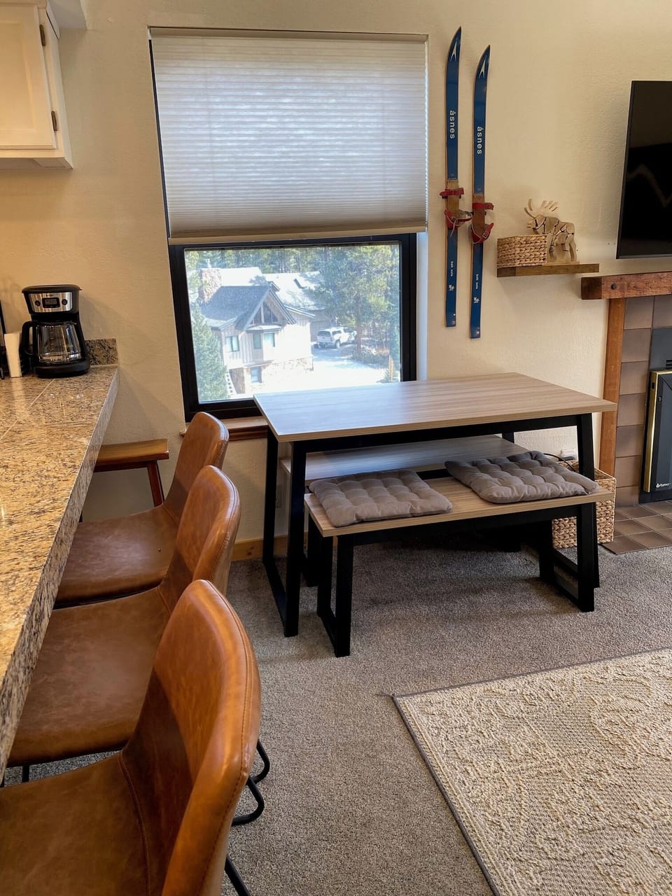Seating for 6 at the island, plus seating for 4 at the dining table.