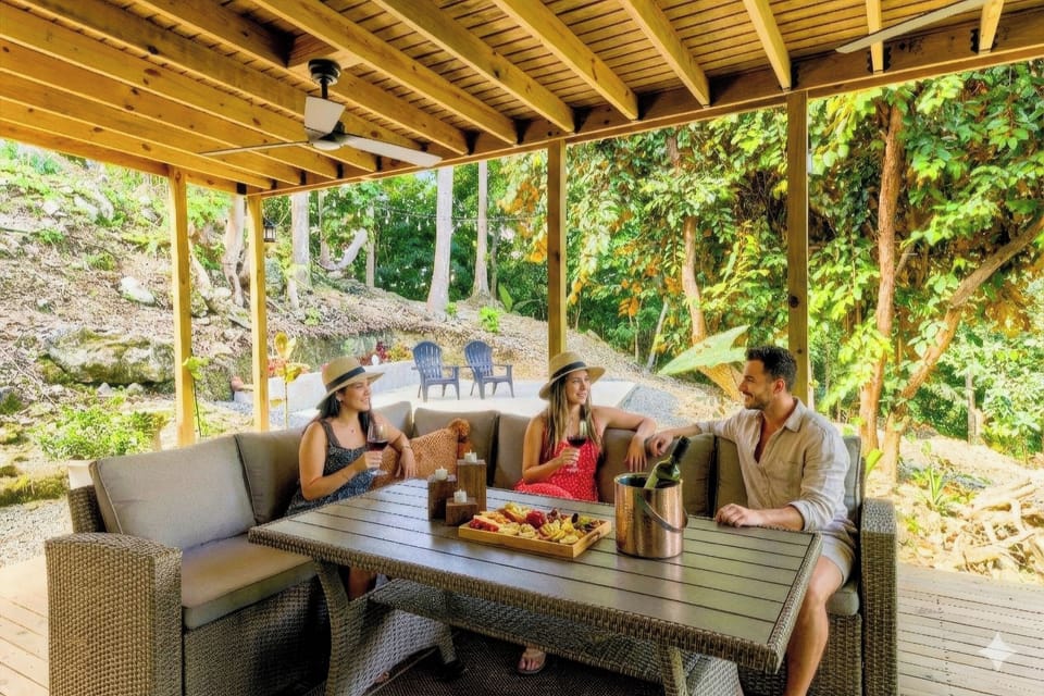 Looking for a place to disconnect to reconnect? This is your place. Covered family terrace with BBQ and outdoor dining, perfect for grill together, sharing meals, and enjoying relaxed family time surrounded by nature.