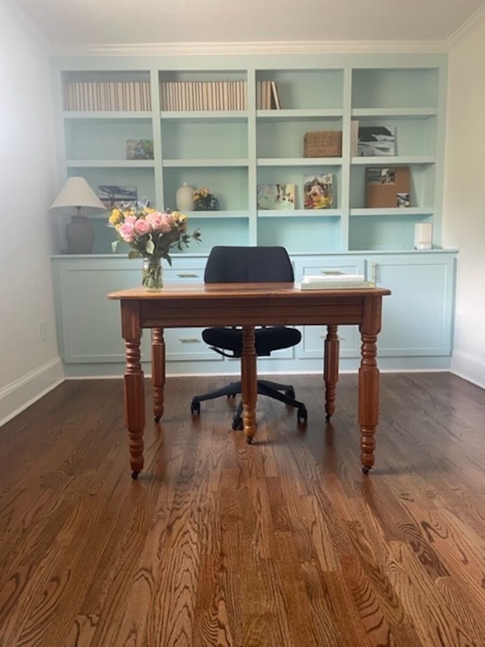 upstairs bedroom with one twin bed and reading library