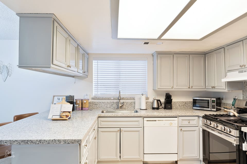 Full kitchen with generous counter space. 
