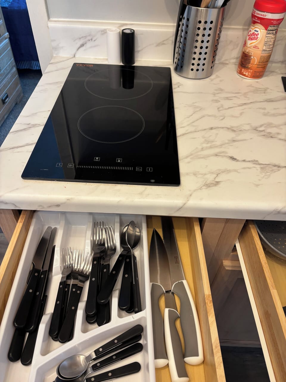Extra  knives,and kithcen gadgets,