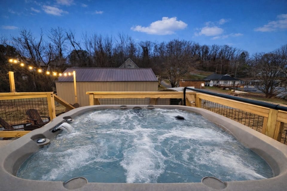 Relax in the private hot tub with powerful jets and open-sky views.
