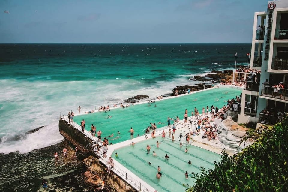 Enjoy a refreshing swim at the Bondi Icebergs rock pools, where guests can dive into ocean-fed waters, take in sweeping coastal views, and experience a true Sydney ritual just moments from the beach.