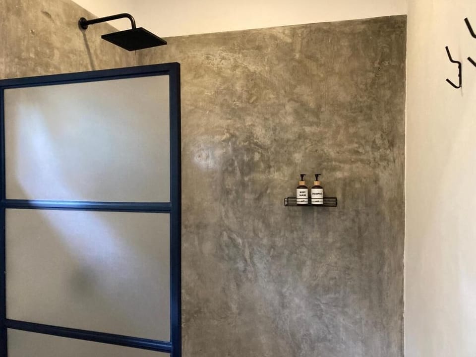 Deluxe Double Room, Pool View | Bathroom | Shower, hair dryer, towels, soap