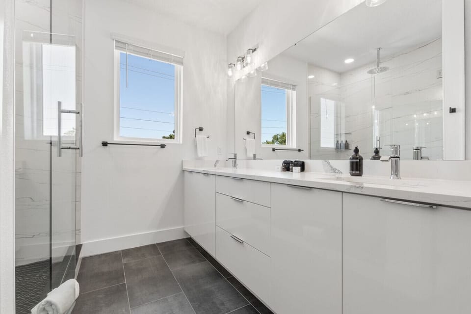 Guest bathroom with double vanity and shower