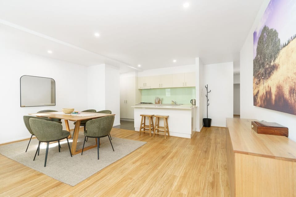 The dining and kitchen area feels open and welcoming, giving you space to cook, eat, and enjoy everyday moments together.