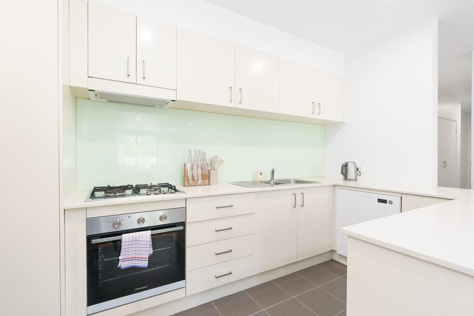 The kitchen is bright, clean, and thoughtfully set up, making it easy to prepare meals, brew your morning coffee, or enjoy a quiet night in.