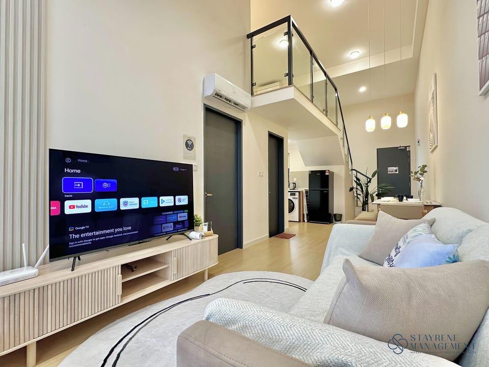 Deluxe Duplex, 2 Bedrooms, City View | Living area | Flat-screen TV