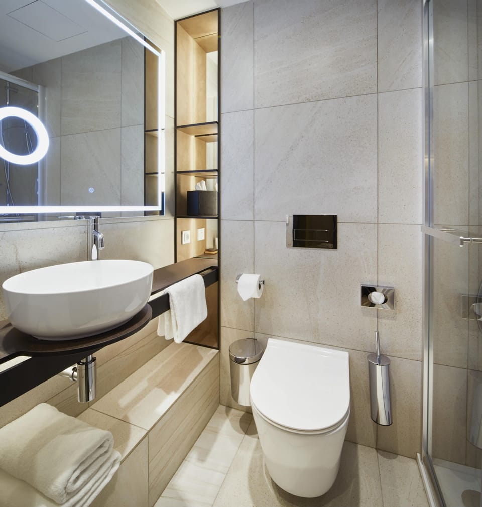Shower, hair dryer, bathrobes, slippers