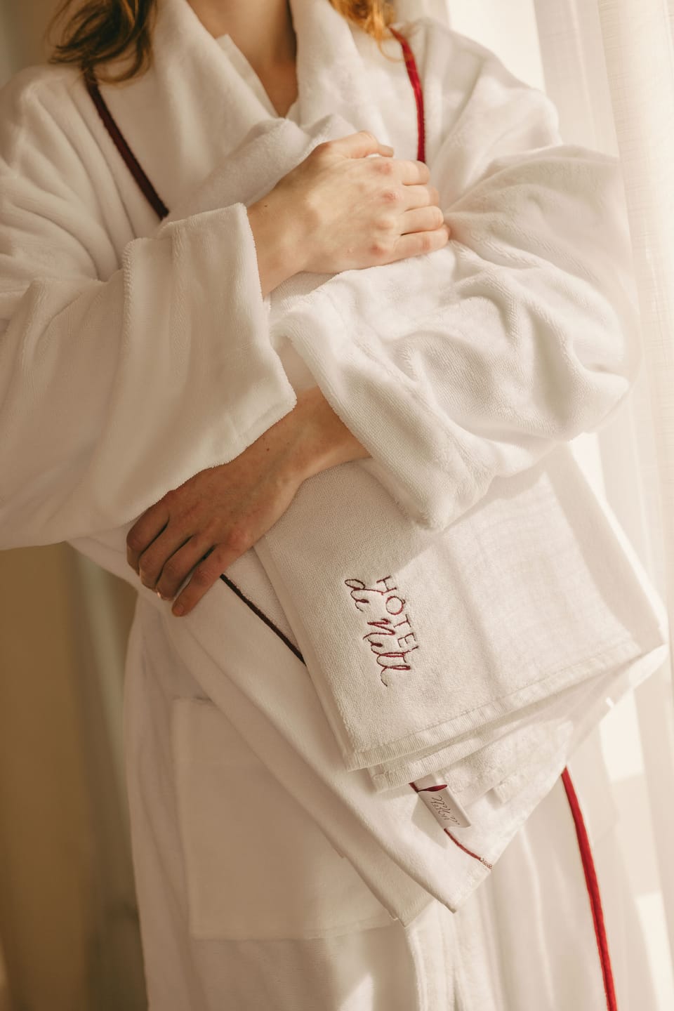 Designer toiletries, hair dryer, bathrobes, slippers