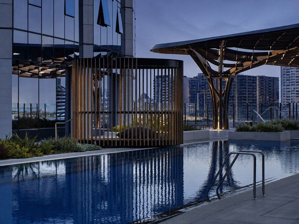 Enjoy an outdoor lap pool, lagoon pool, cabanas, and barbeque grills on Level 8. Note: a safety induction is required to use the amenities.