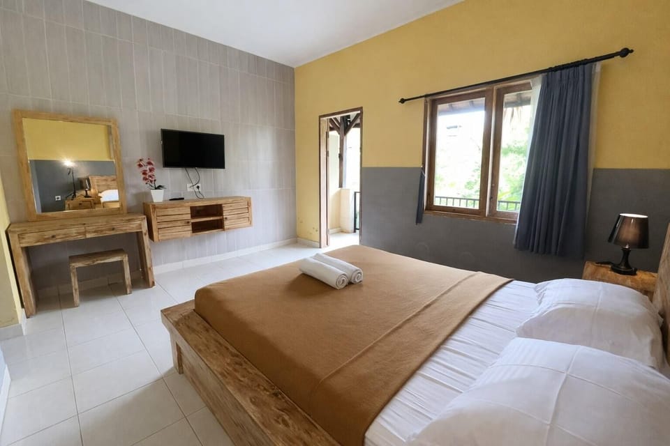 Deluxe Double Room, Balcony, Pool View | Laptop workspace, free WiFi