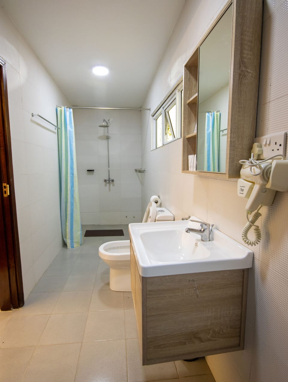 Deluxe Tent | Bathroom | Rainfall showerhead, free toiletries, hair dryer, bathrobes