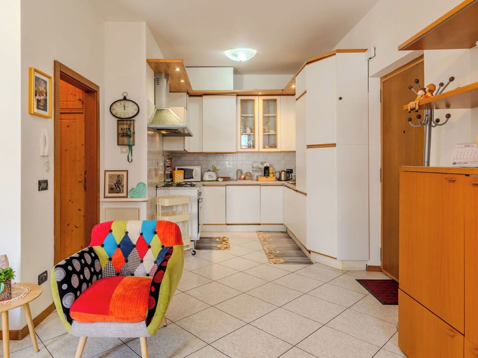 Interior Design, Furniture, Flooring, Wood, Floor, Ceiling, Room, Lighting, Cabinetry, Kitchen
