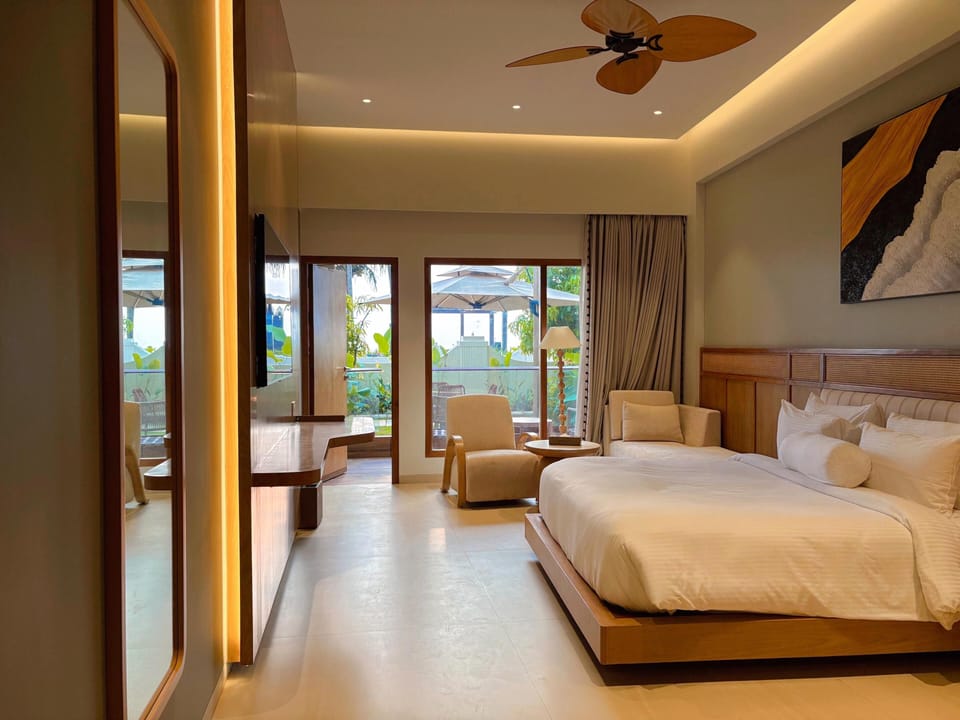Garden Sea View Room | Egyptian cotton sheets, premium bedding, down comforters, in-room safe