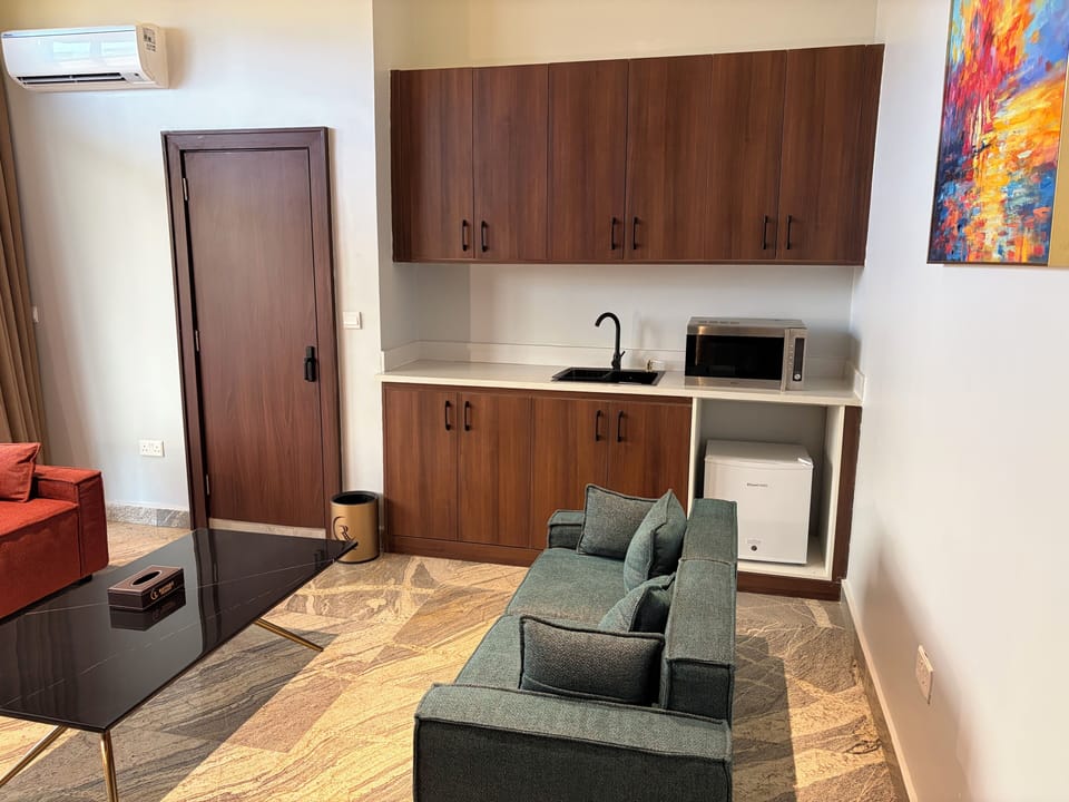 Signature Room, City View | Living area | TV, printers