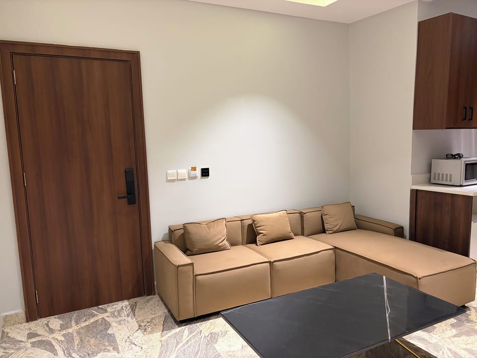 Luxury Room, Courtyard View | Living area | TV, printers