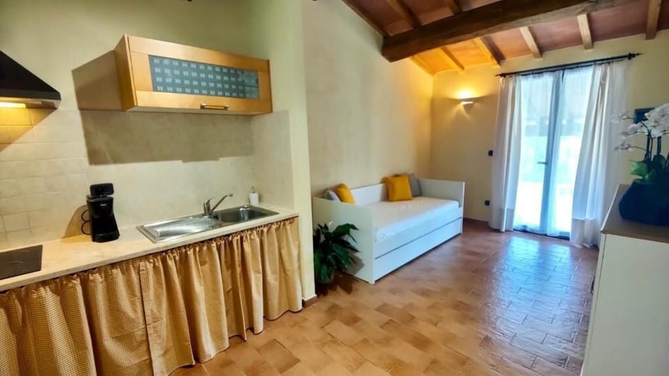 Comfort Apartment, Garden View | Living area | 43-inch Smart TV with digital channels
