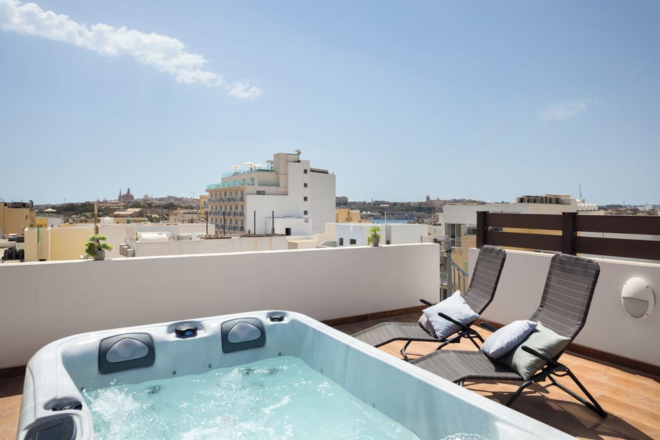 Penthouse, City View | Outdoor spa tub