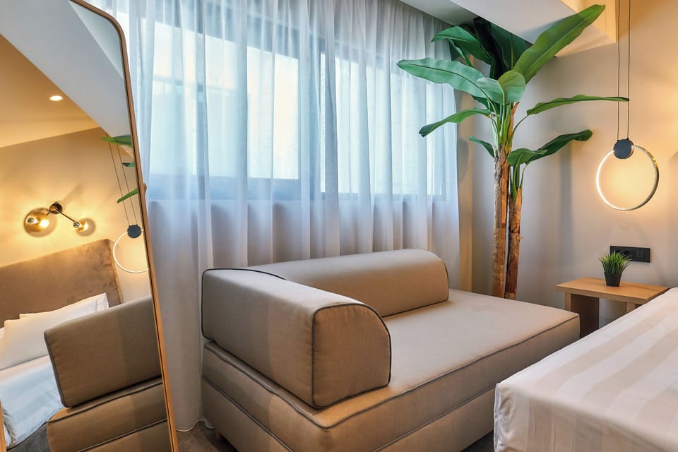 Superior Room | Living area | 50-inch Smart TV with digital channels