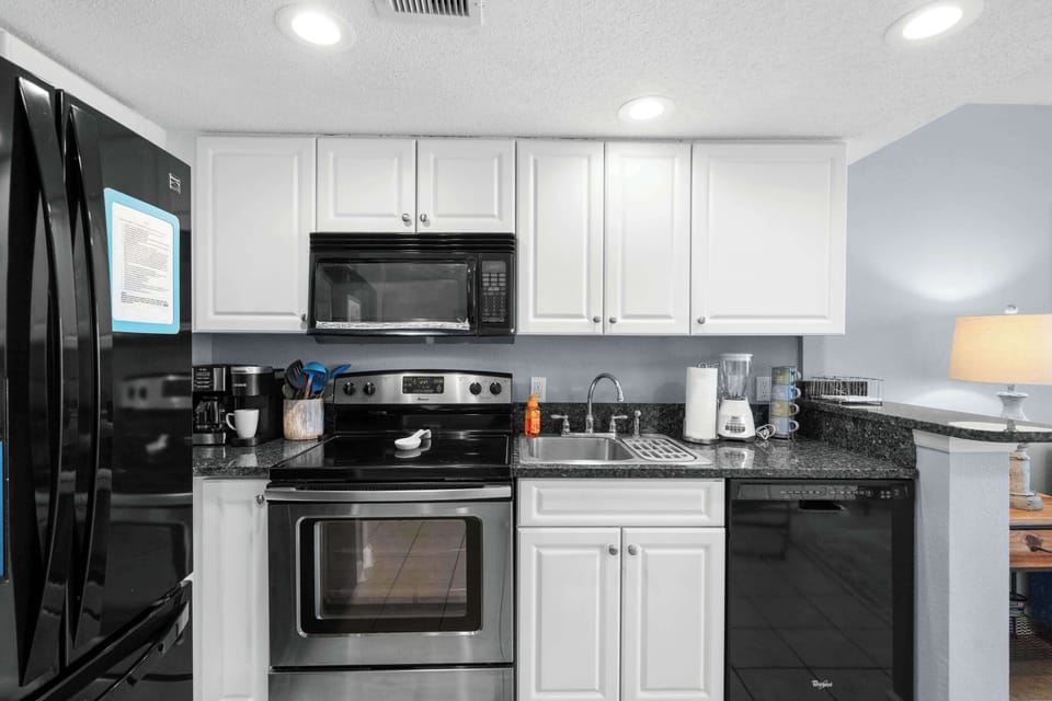 Kitchen includes full-size appliances and essentials