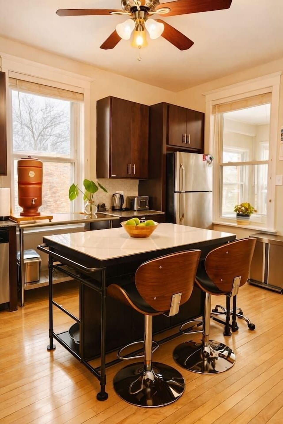Modern kitchen with full appliances and plenty of space to cook and gather.
