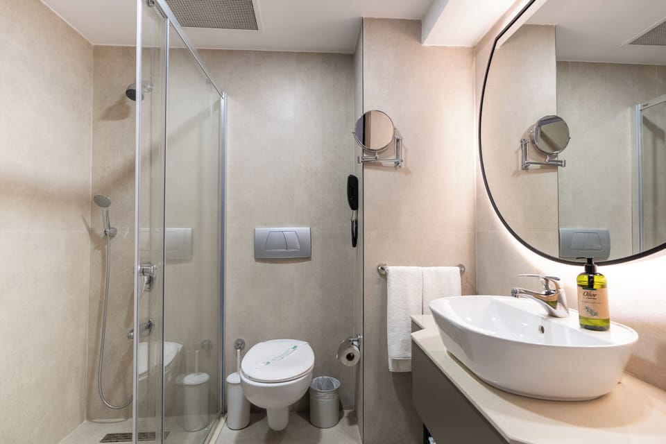 Shower, free toiletries, hair dryer, towels