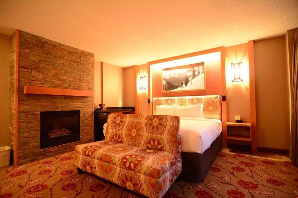 Relax in this stunning, newly renovated room and warm up next to the fire after a long day outside.