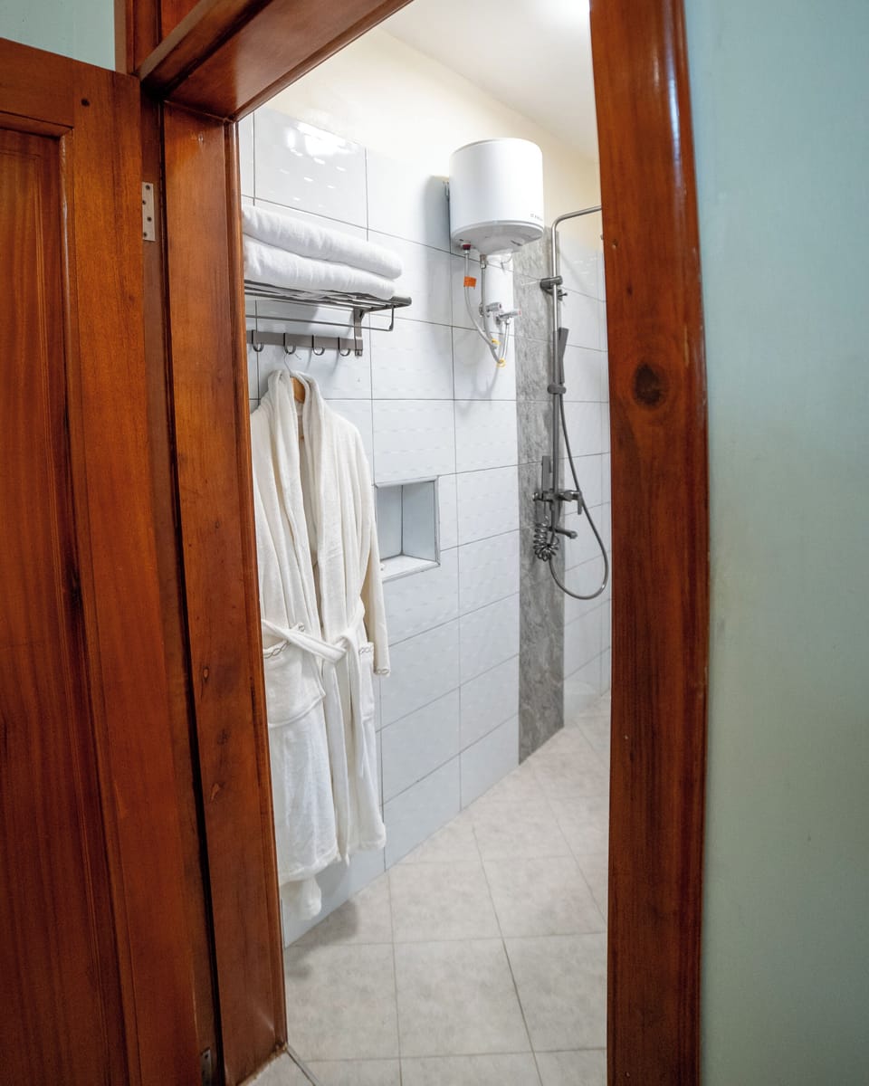 Bathrobes, slippers, towels, soap