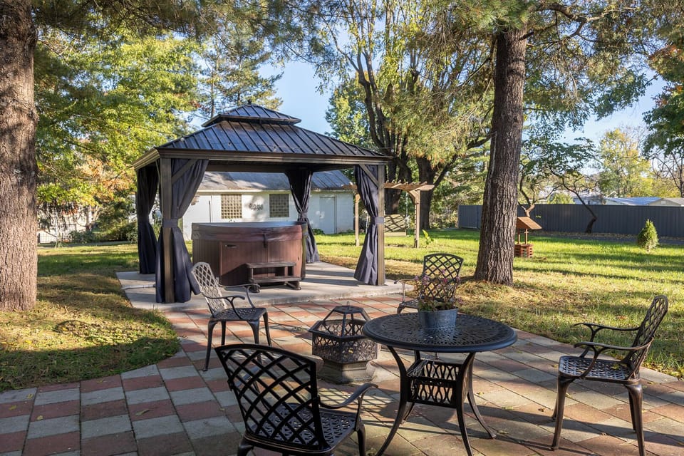 Gazebo, hot tub and patio with fire pit.