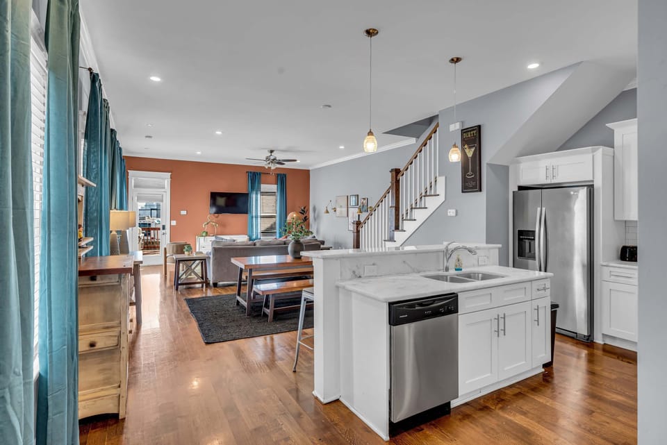 The kitchen island becomes the nerve center of the house: prep your pre-Broadway dinner here while staying connected to everyone in the living room beyond