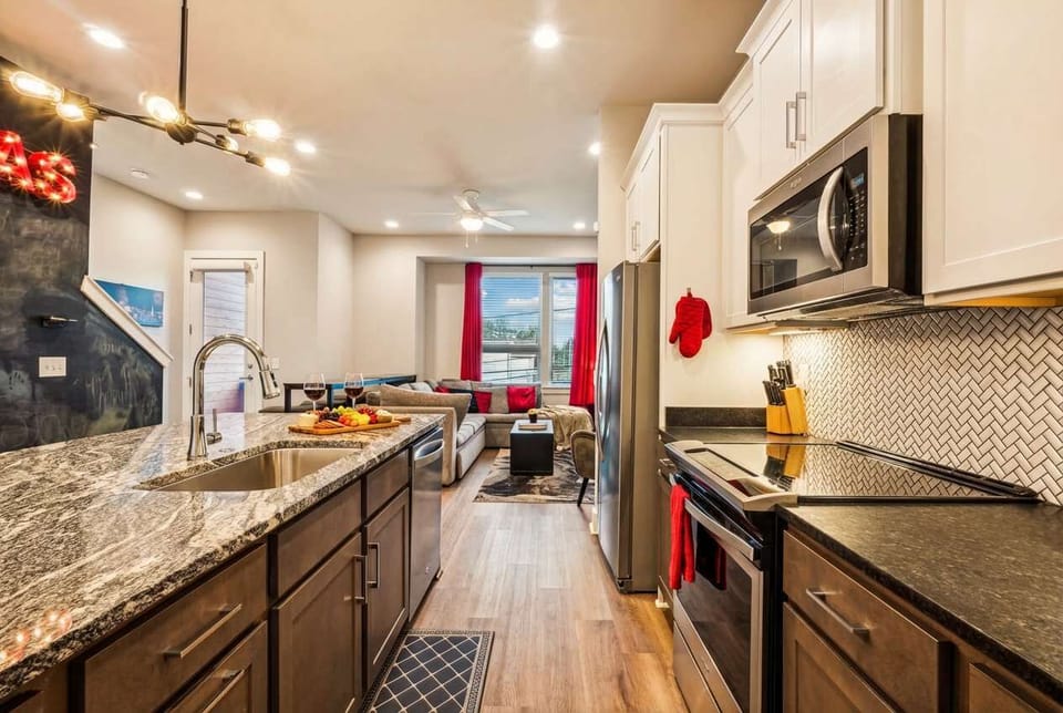 The kitchen island is command central for your group, with the open plan keeping the cook part of every conversation and laugh