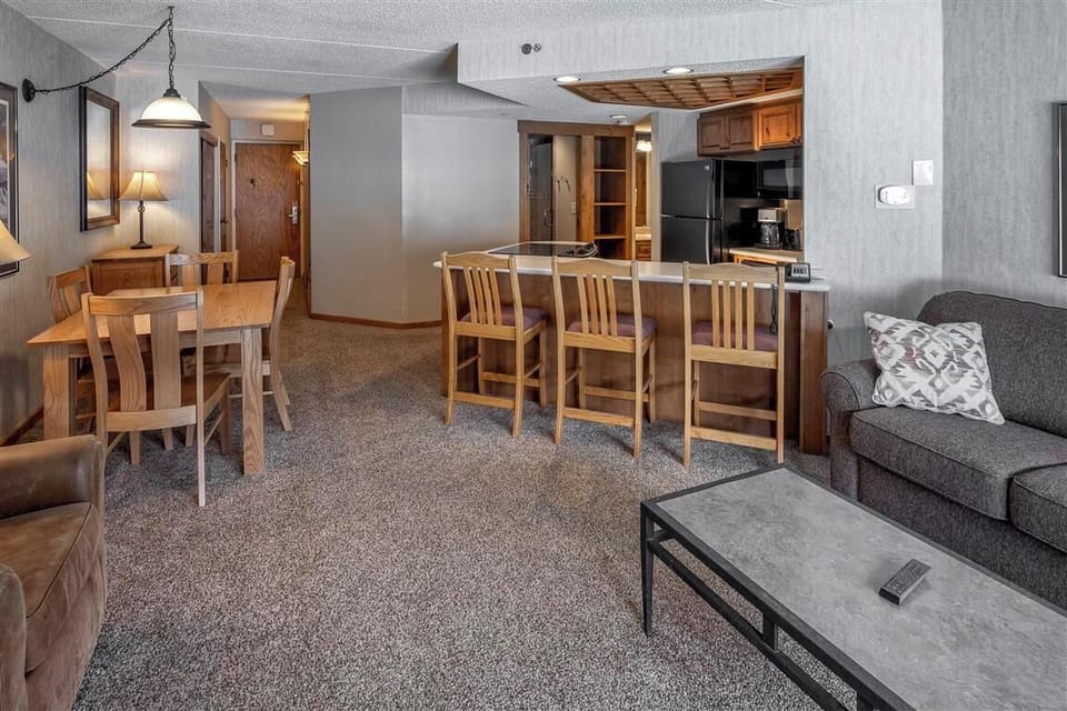 Enjoy shared meals in the spacious dining area with warm mountain charm.
