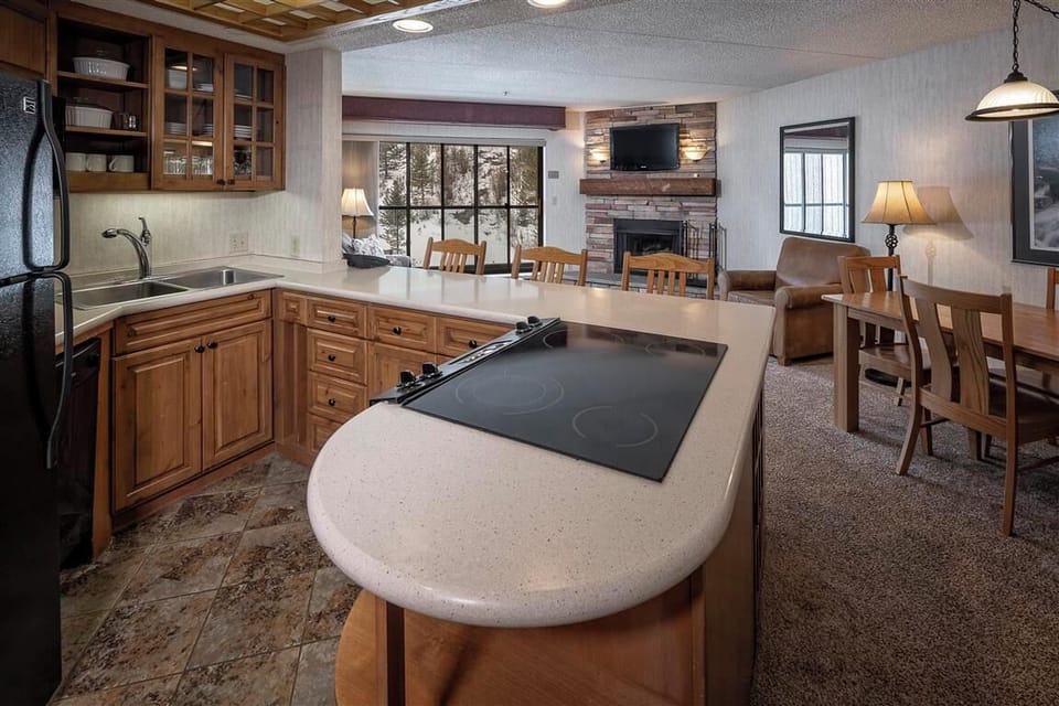 Prepare meals in the fully-equipped kitchen with a large center island.
