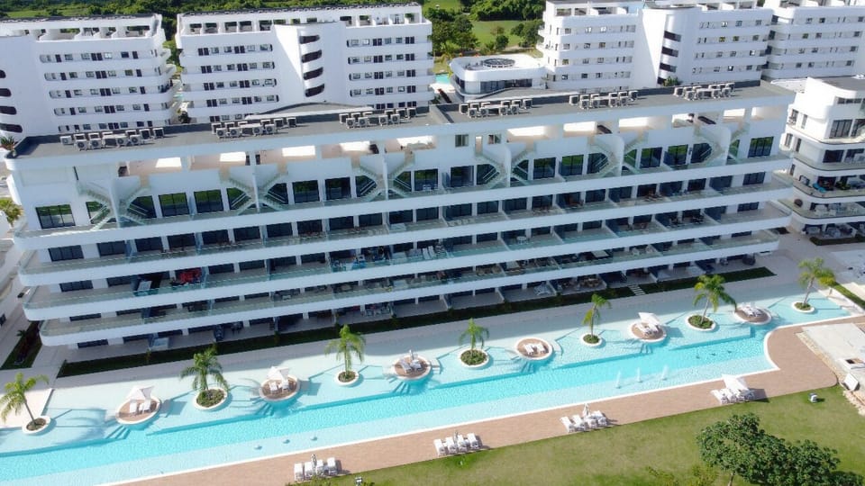 2 outdoor pools, pool umbrellas, sun loungers