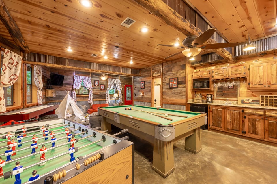 Pool, foosball, and laughter—your cabin game night starts here.