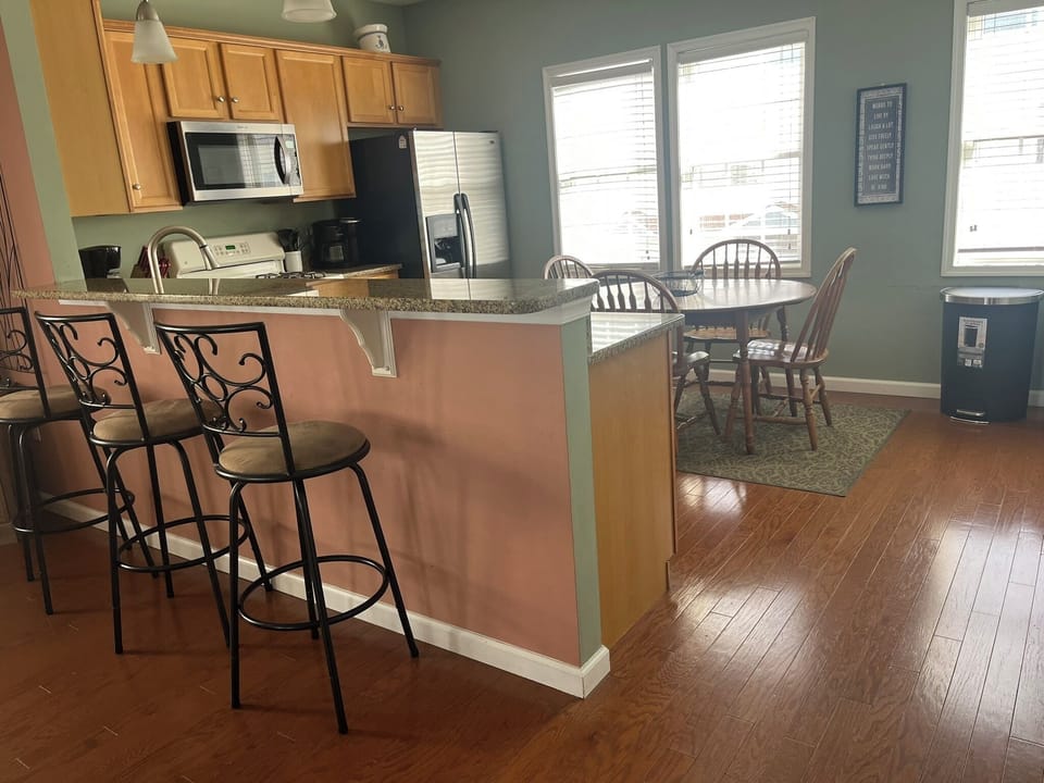 Breakfast bar overlooking the living area and kitchen
