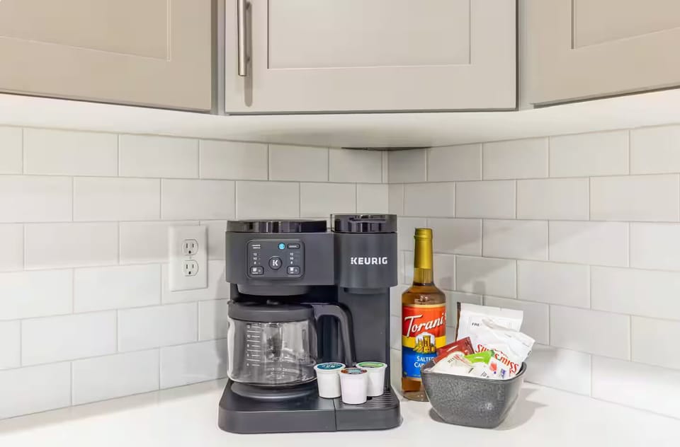 Keurig and drip coffee machine on a stylish countertop, ready for your morning brew or evening hot cocoa.
