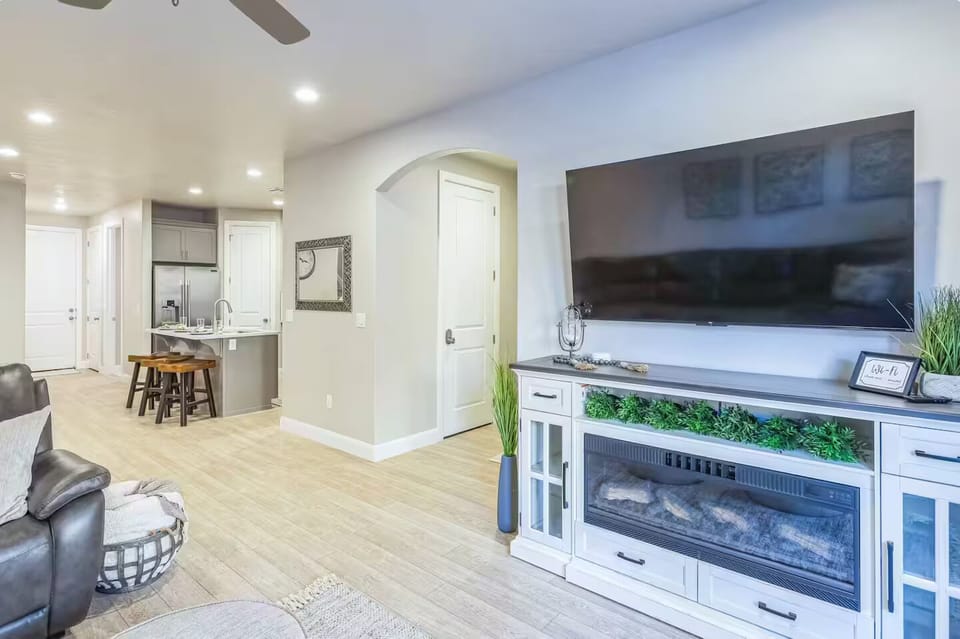 Relax in comfort-- watch TV or movies on the 75" Roku TV, with seat space for the whole family!