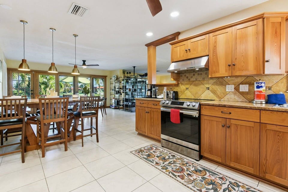 Kitchen & Dining Area  The fully equipped kitchen and dining space is perfect for gathering. With ample counter space and seating options.