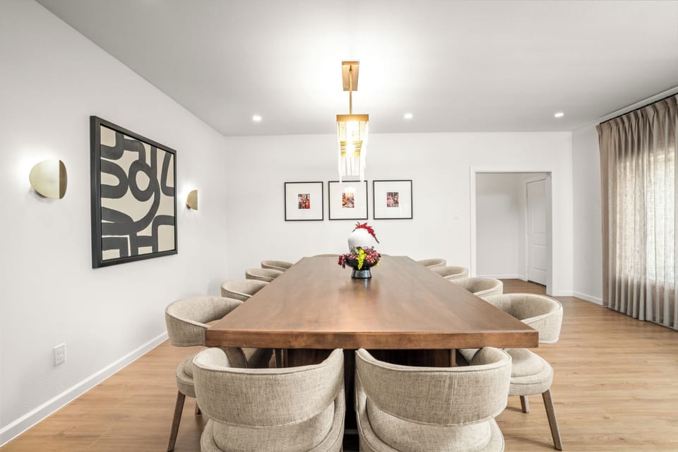 Expansive dining room with a welcoming layout, perfect for hosting meals.