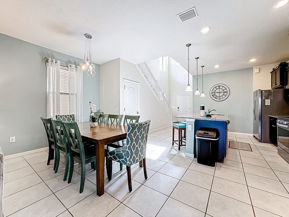 Share meals and memories at the family dining table, with seating for everyone to gather together.