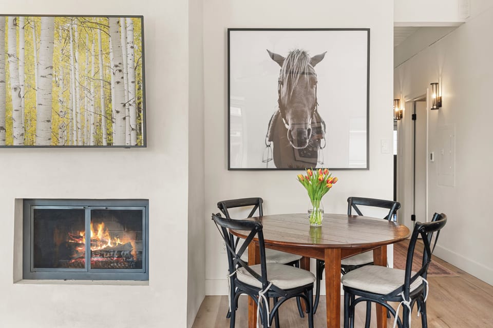 Spacious top-floor 3 bedroom, 2 bath condo with wood-burning fire and Aspen Mountain views in the Chateau Chaumont building.