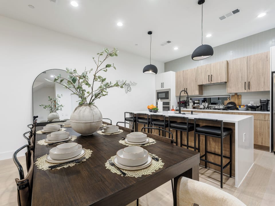 Dining Area: Bright modern space with stylish decor, perfect for gatherings.