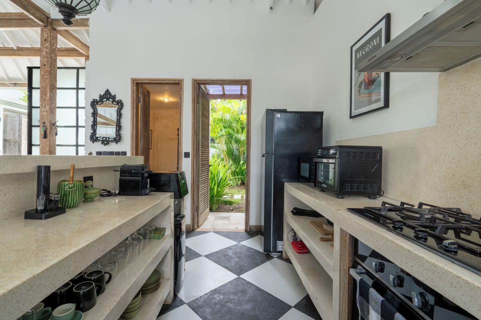 Villa | Private kitchen | Coffee/tea maker, toaster, highchair, dining tables